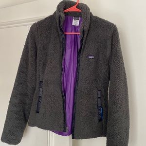 Super warm Patagonia. Women’s Small. Charcoal grey with purple lining.